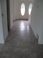 Tile Laid and Grouted in Hall