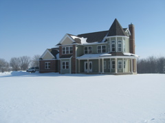 House Front View in Snow